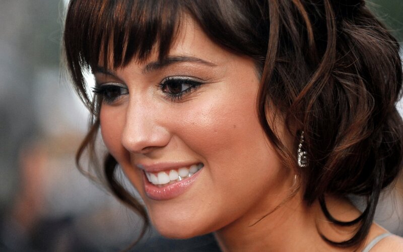 woman smiling at event