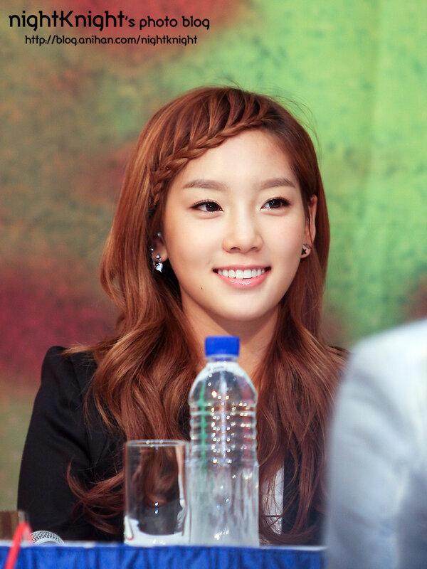 woman smiling at event
