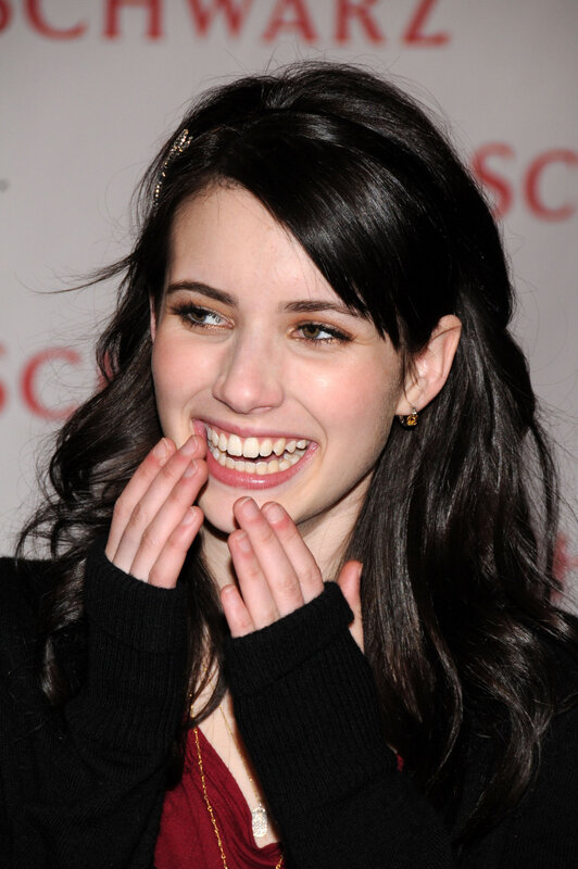 woman smiling at event