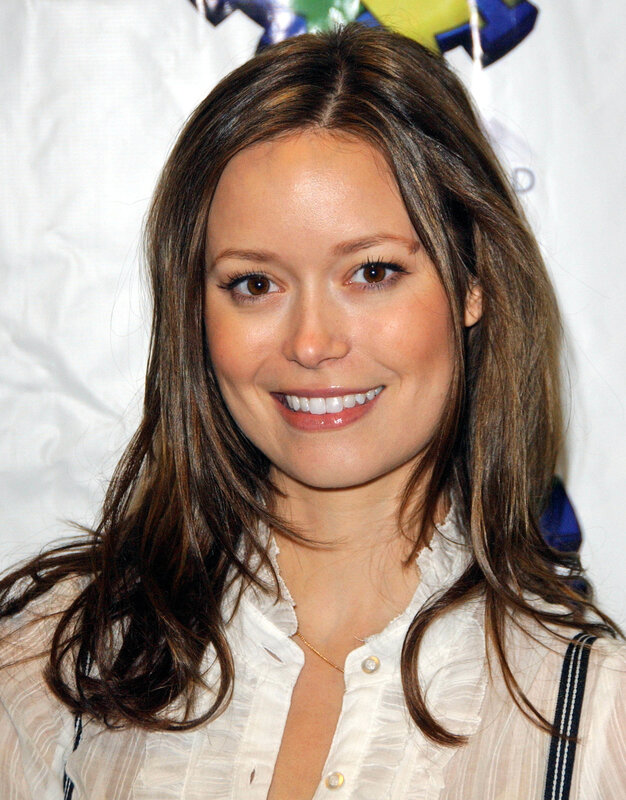 woman smiling at event