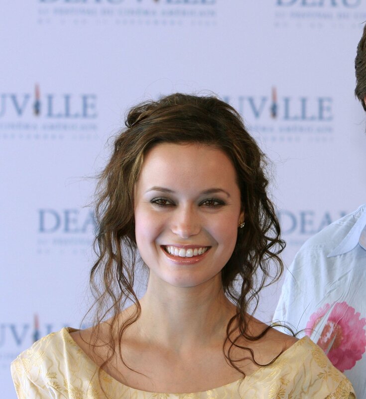 woman smiling at event