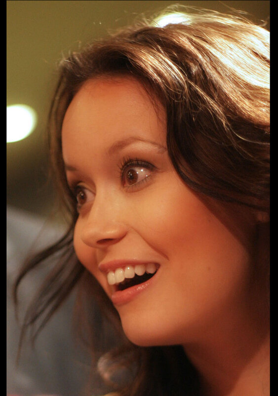 woman smiling at event