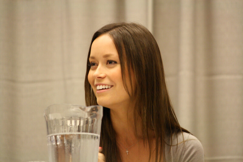woman smiling at event