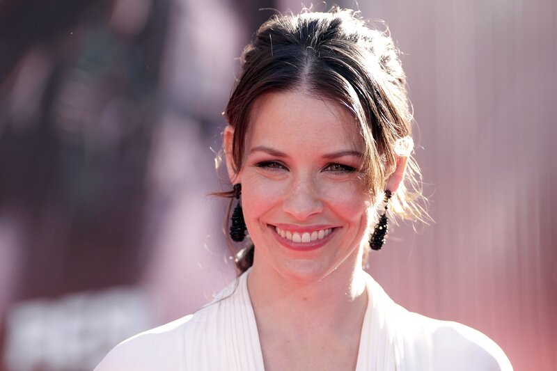 woman smiling at event