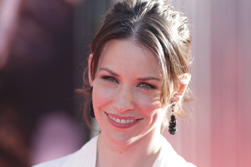 woman smiling at event