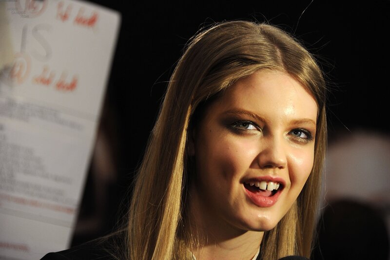 woman smiling at event
