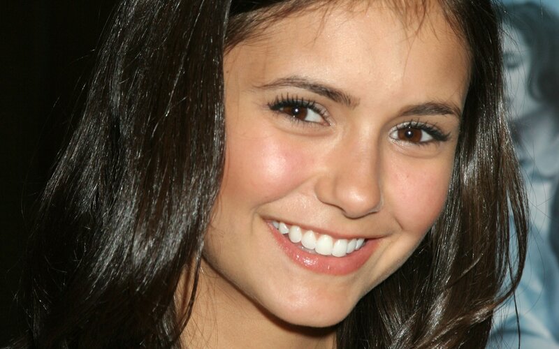woman smiling at event