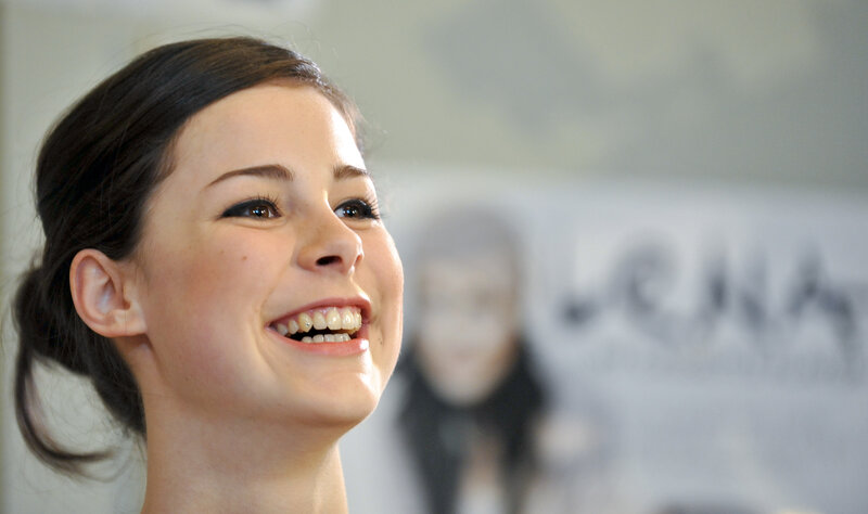 woman smiling at event