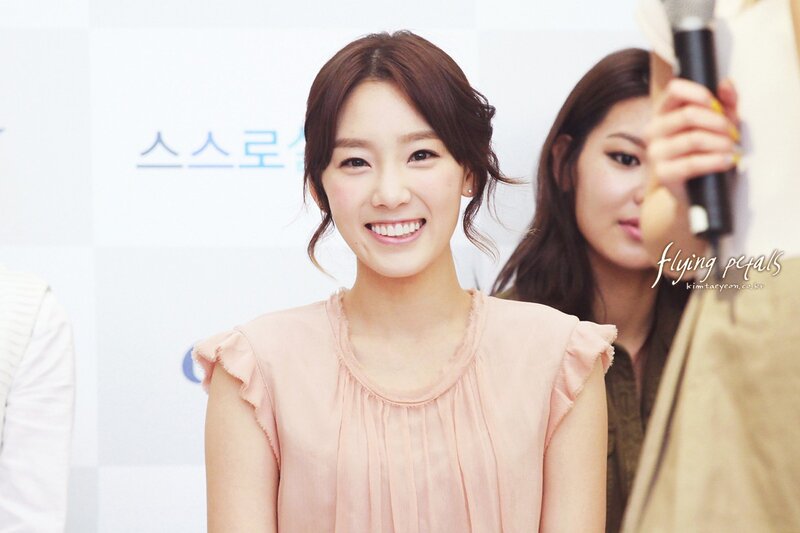 woman smiling at event