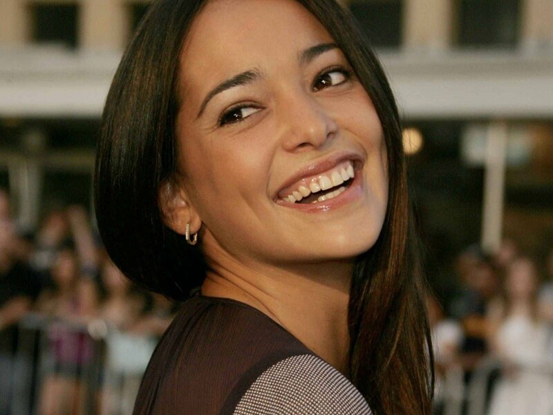 woman smiling at event