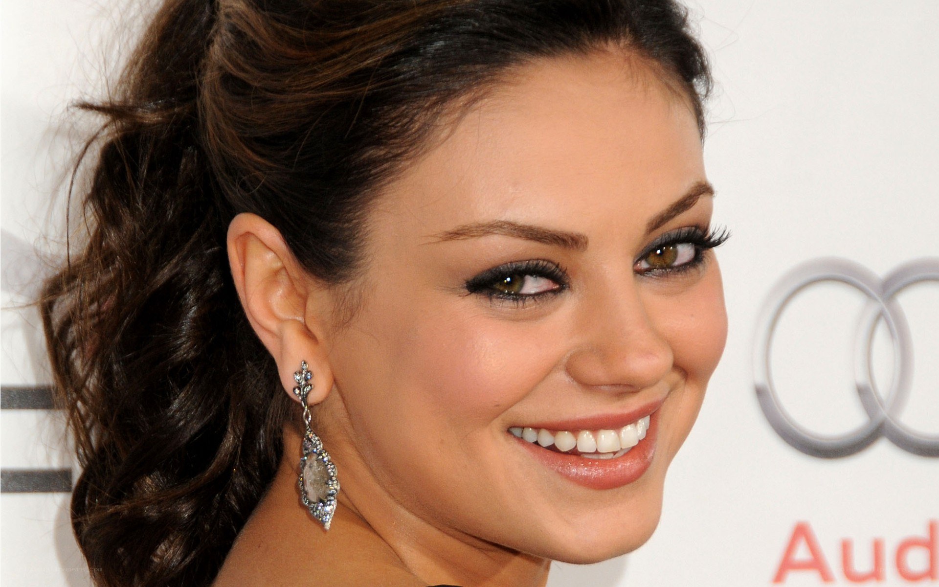 woman smiling at event