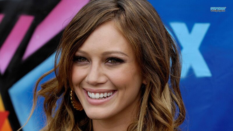 woman smiling at event