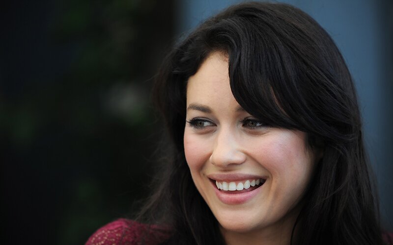 woman smiling at event