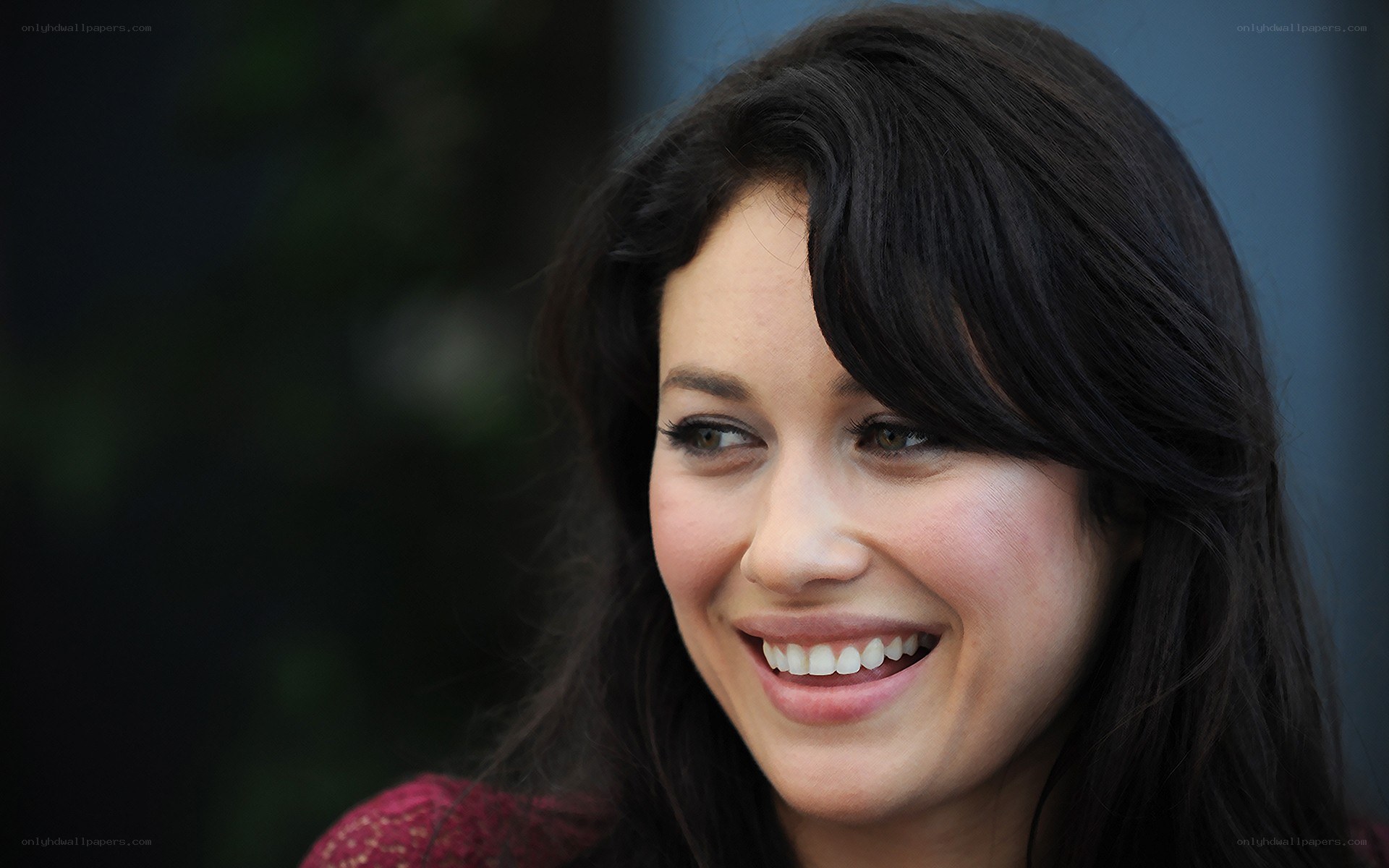 woman smiling at event