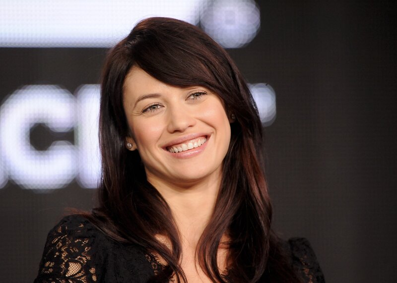 woman smiling at event