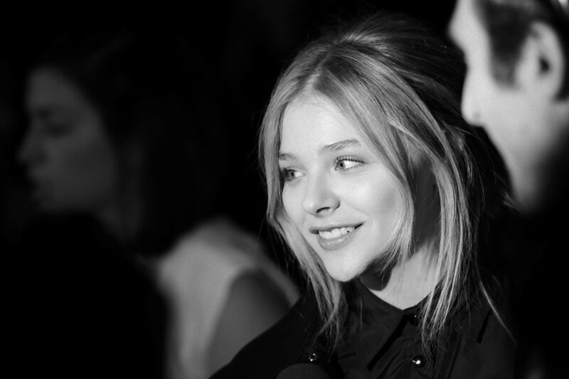 woman smiling at event