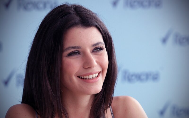 woman smiling at event