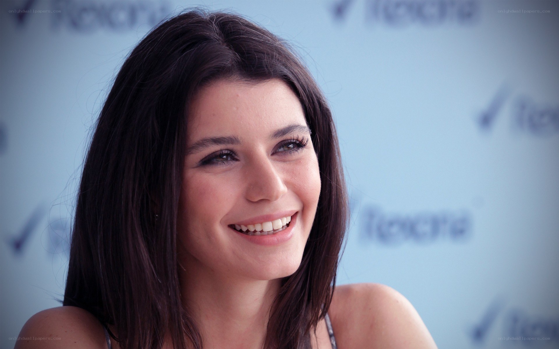 woman smiling at event
