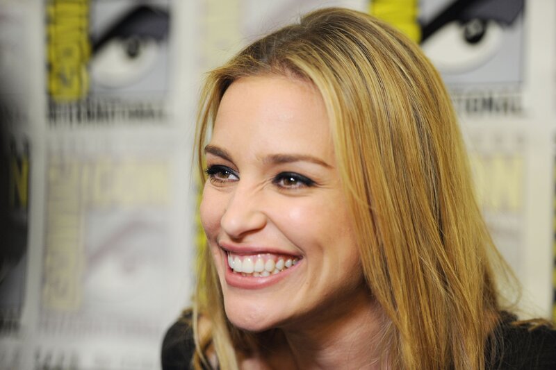 woman smiling at event