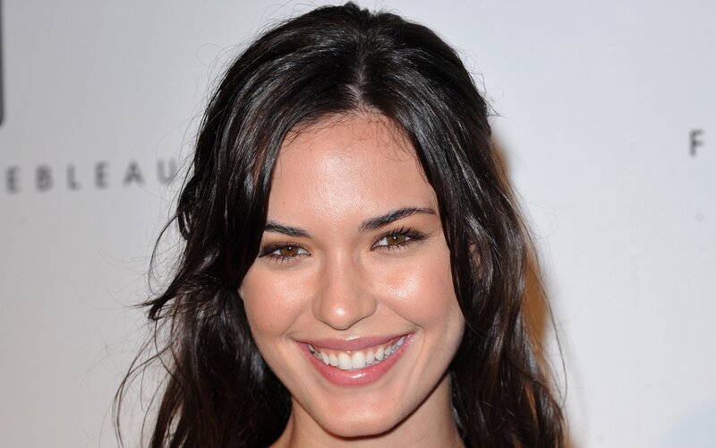 woman smiling at event