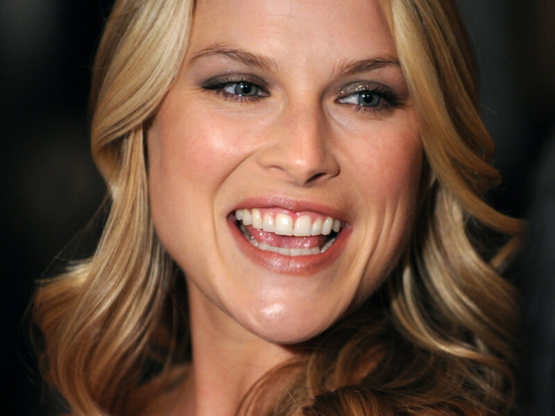 woman smiling at event