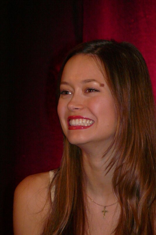 woman smiling at event
