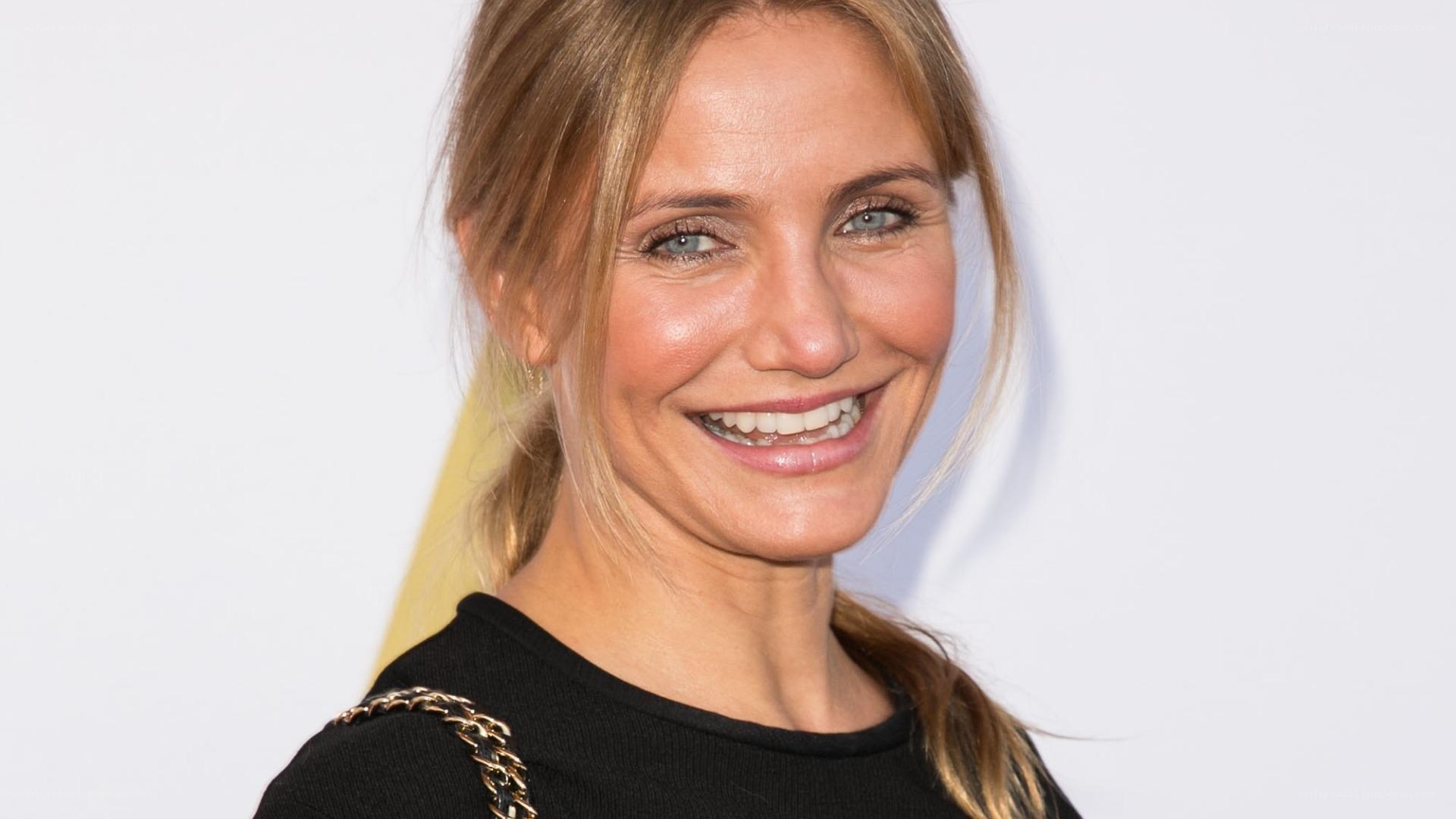 woman smiling at event