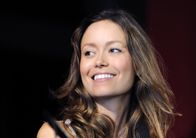 woman smiling at event