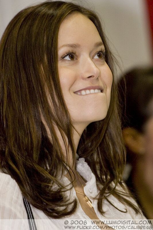 woman smiling at event