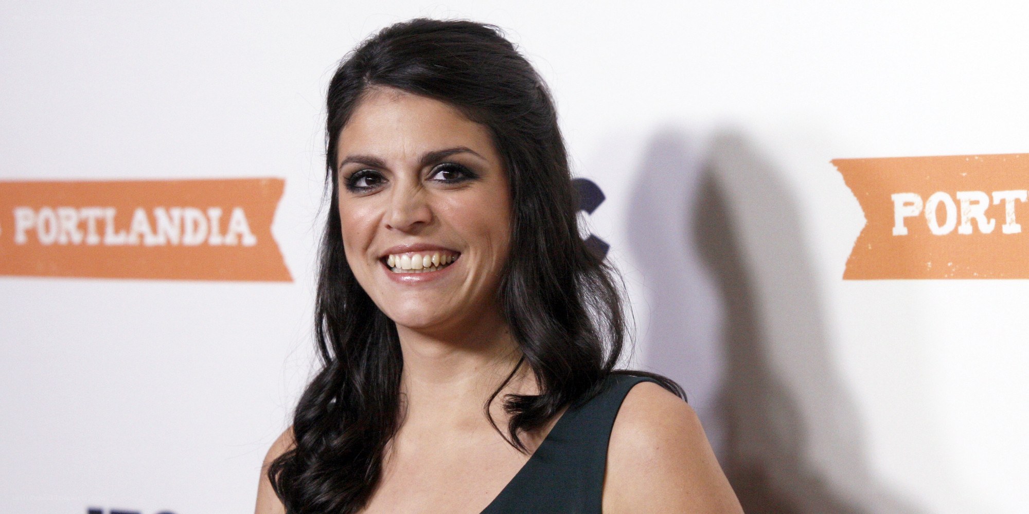 woman smiling at event