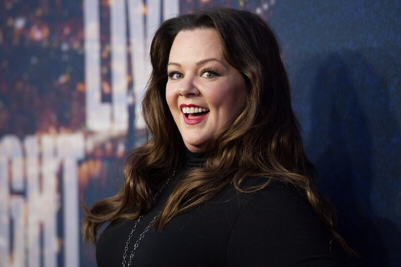 woman smiling at event