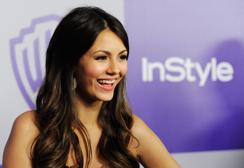 woman smiling at event