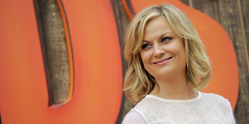 woman smiling at event