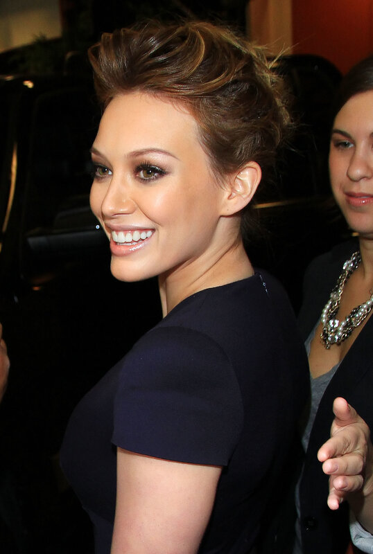 woman smiling at event