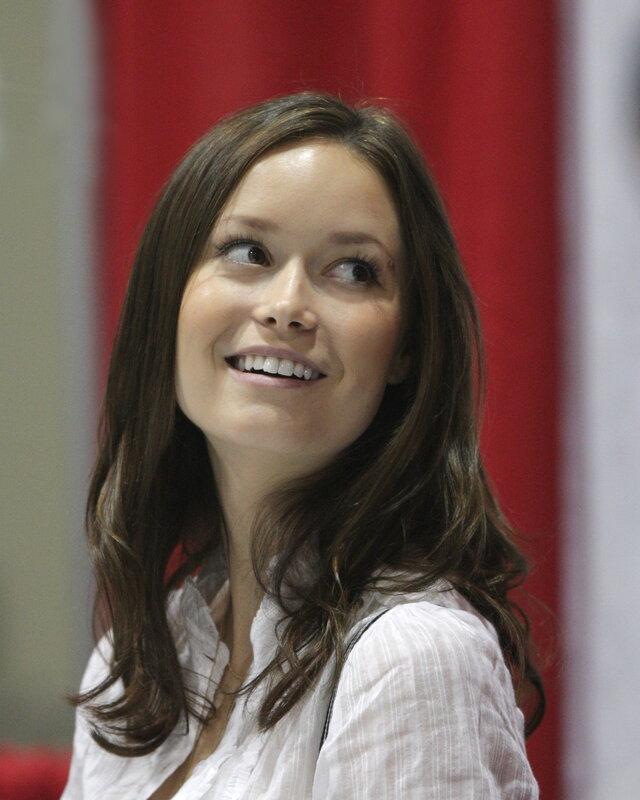 woman smiling at event