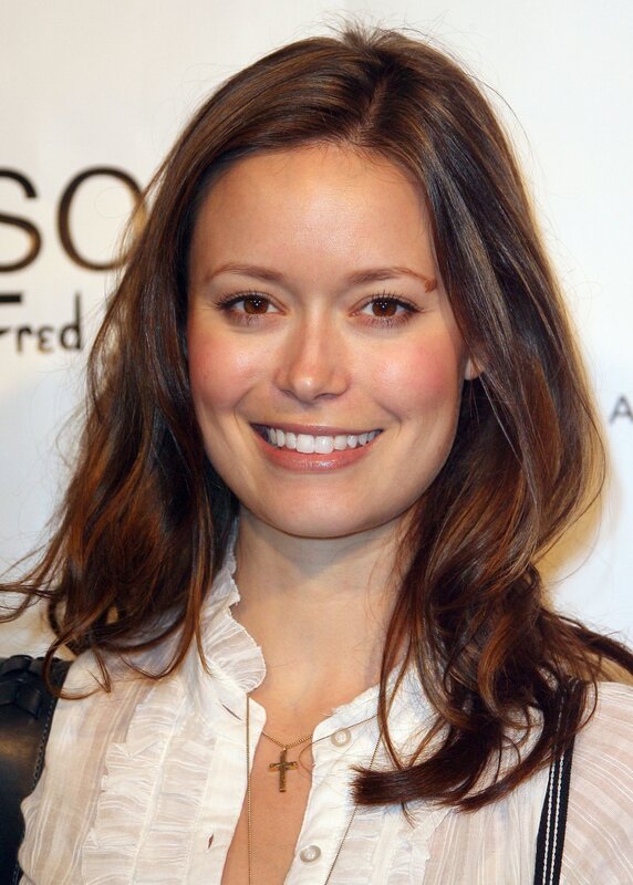 woman smiling at event