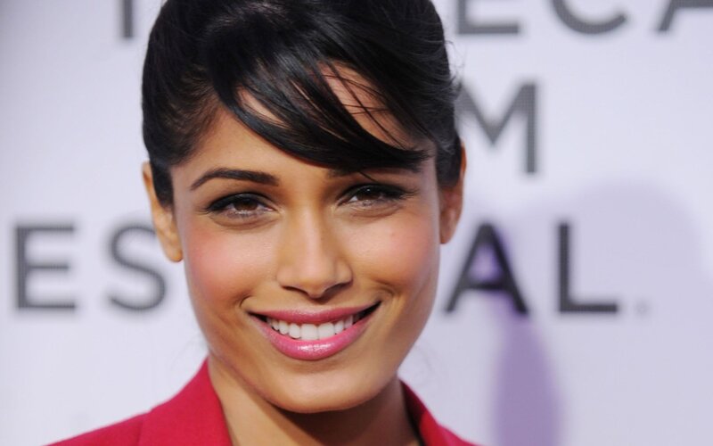woman smiling at film festival