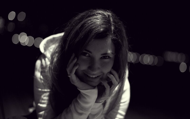 woman smiling at night