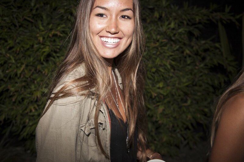 woman smiling at night