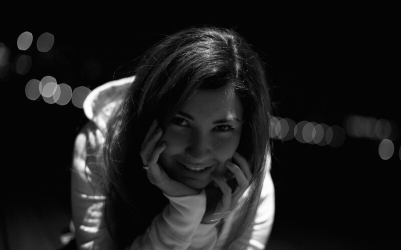 woman smiling at night