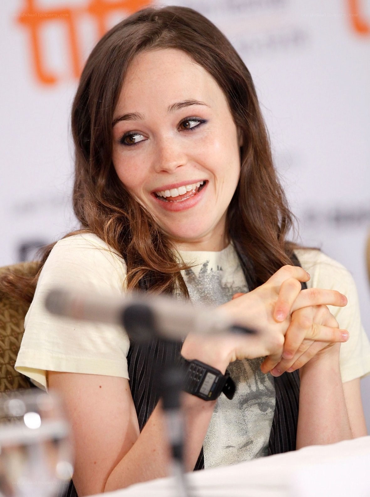 woman smiling at panel