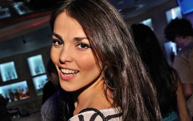 woman smiling at party