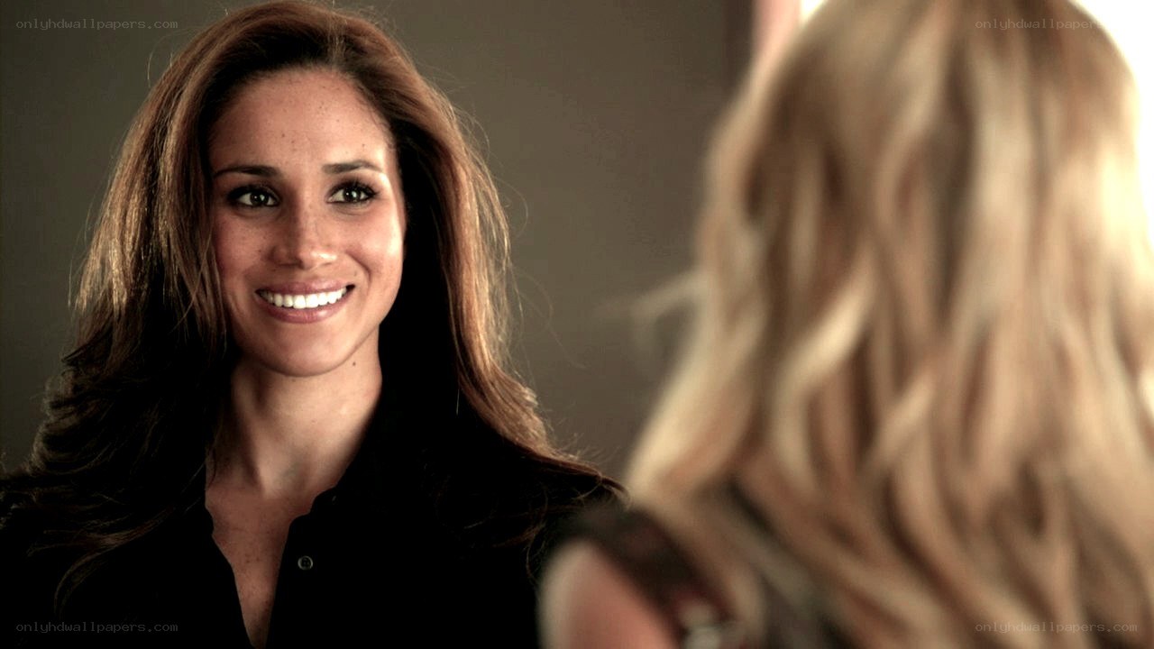 woman smiling at reflection