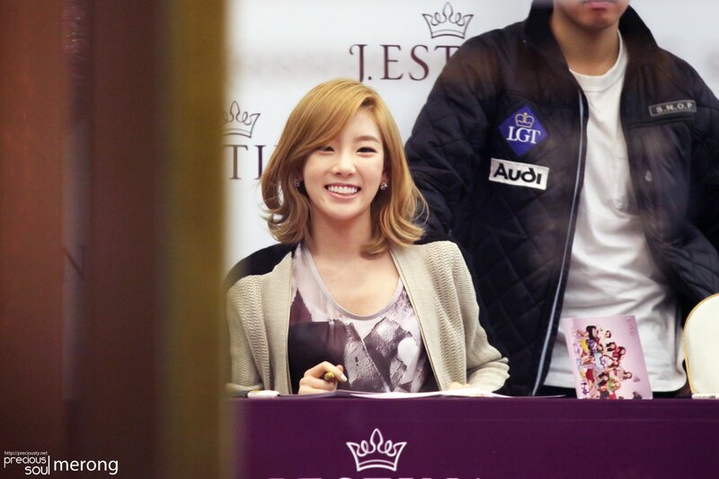 woman smiling at signing event