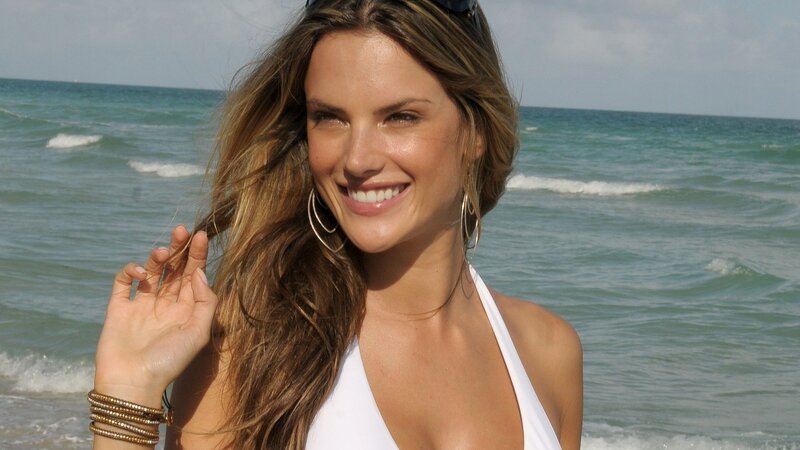 Woman smiling at the beach