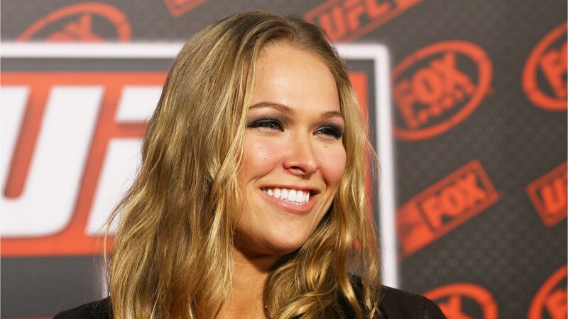 Woman smiling at UFC event