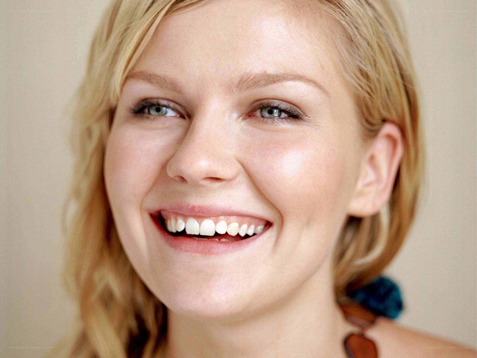 woman smiling brightly