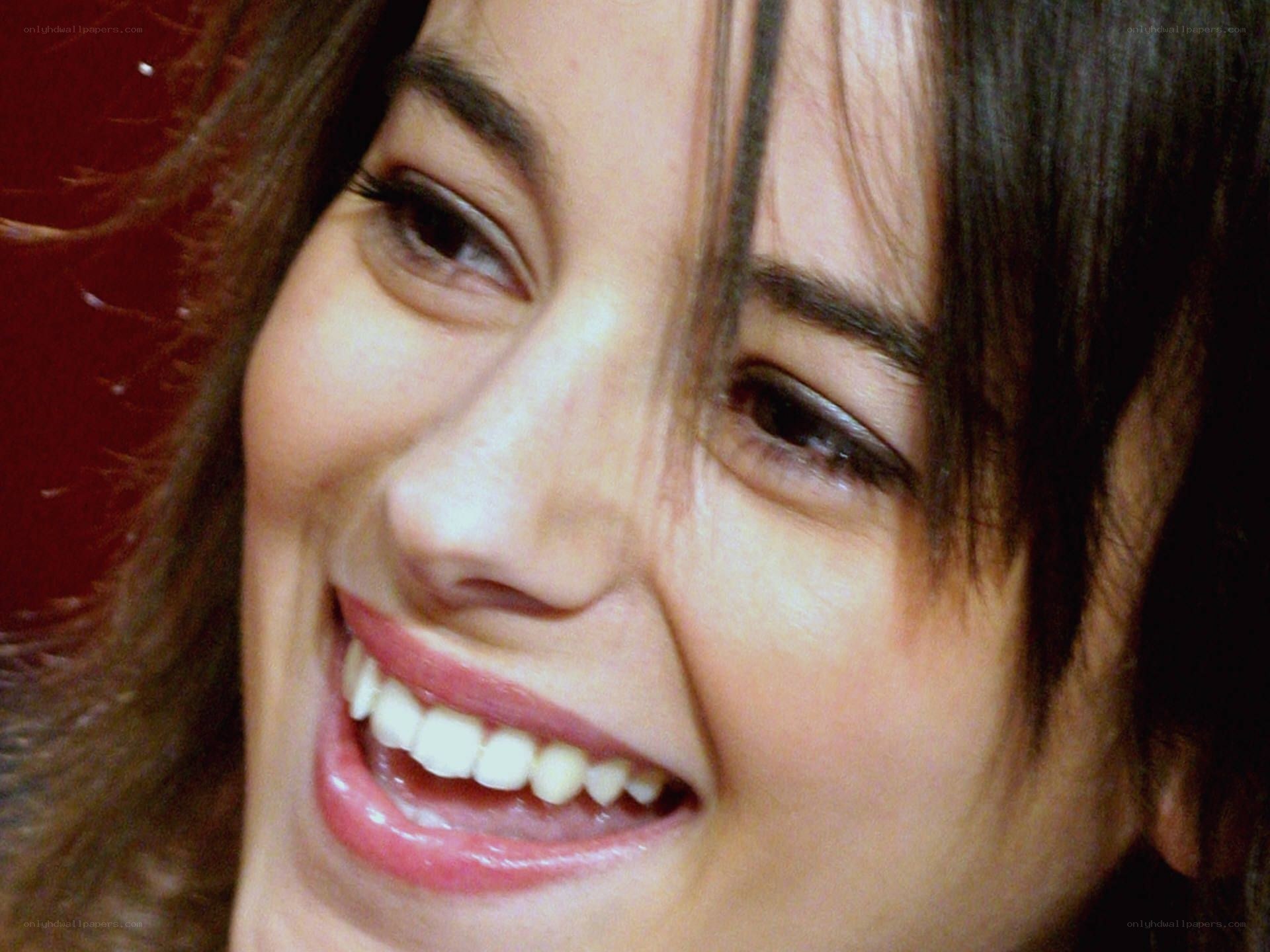 woman smiling brightly