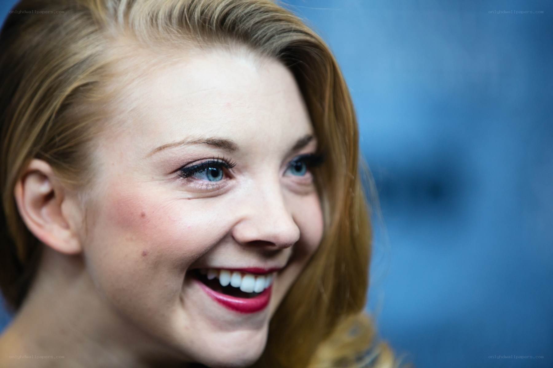 woman smiling brightly