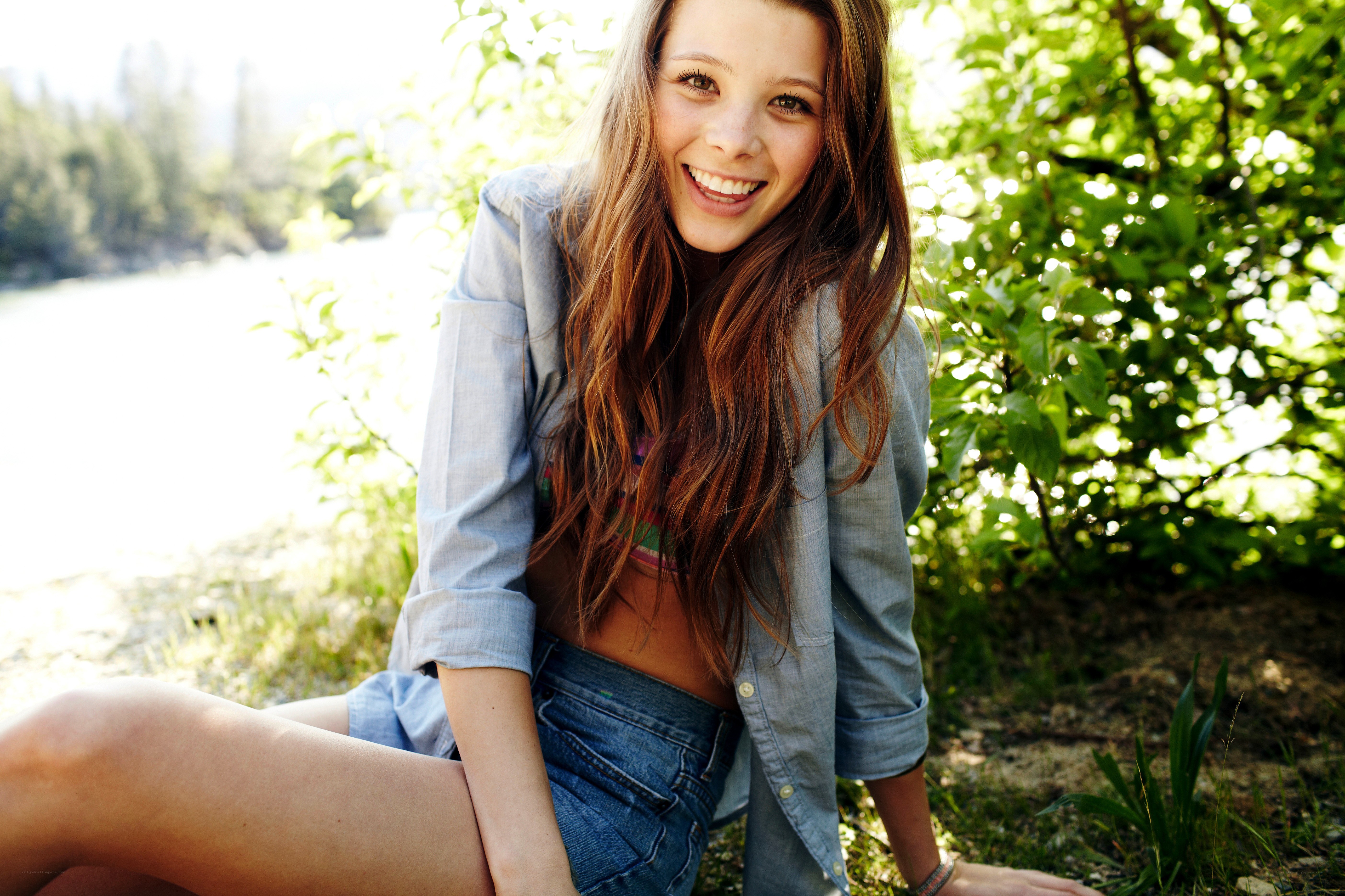 woman smiling by river